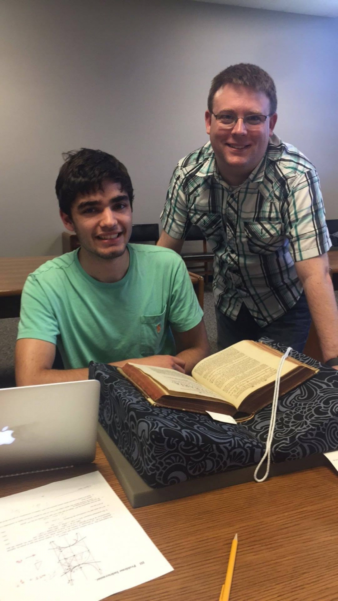 Taner Kiral and Colin McKinney with original copy of Clairaut's article.