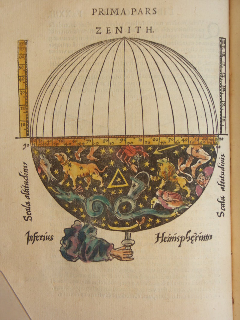 Hand-colored astronomical plate from a 1539 printing of Peter Apian's Cosmographia.