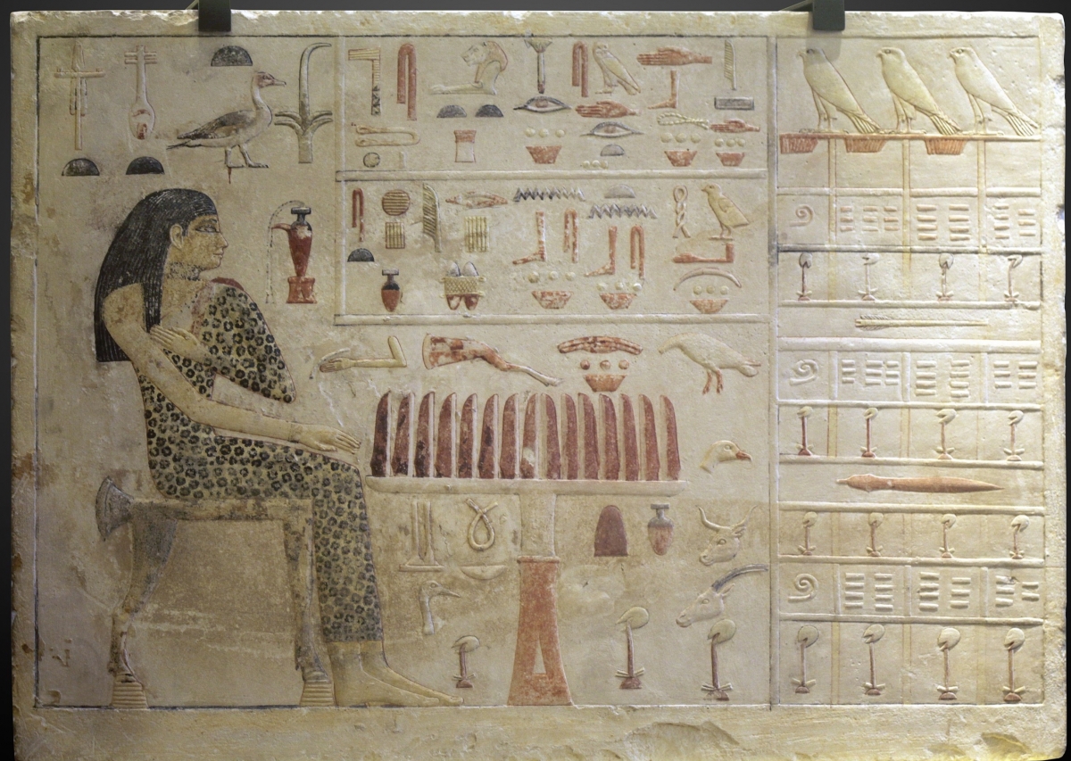 Egyptian numerals depicted on slab stele of Old Kingdom princess Neferetiabet (2590–2565 BC).